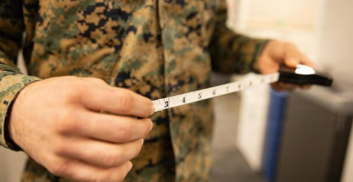 Army body fat measurement following height and weight check
